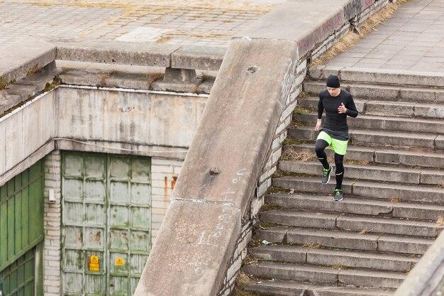 Man working out on concrete stairs